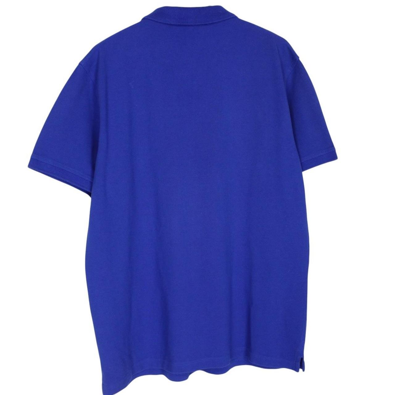 Lyle & Scott blue short sleeve polo shirt with embroidered logo and cotton material.