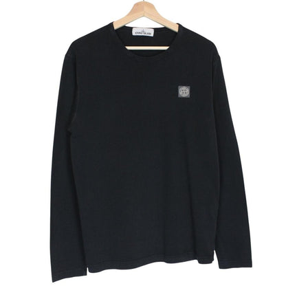 Stone Island black long sleeve t-shirt with compass logo and pocket detail.