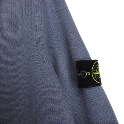 Stone Island blue wool knit jumper with logo patch and ribbed cuffs.