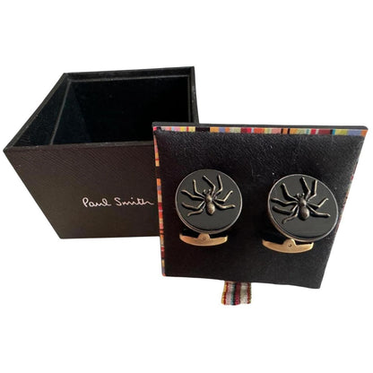 Paul Smith gunmetal cufflinks 2D spider design with intricate detailing and brand logo.