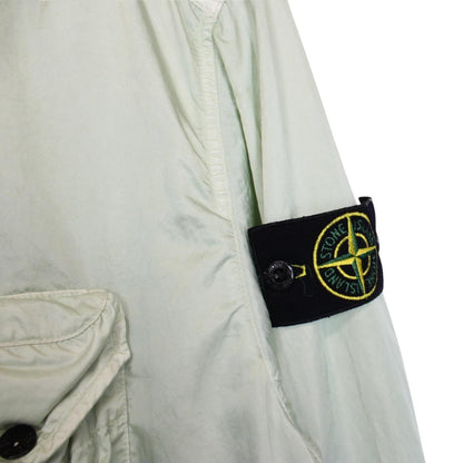 Stone Island mint green multi pocket jacket with logo patch and nylon material.