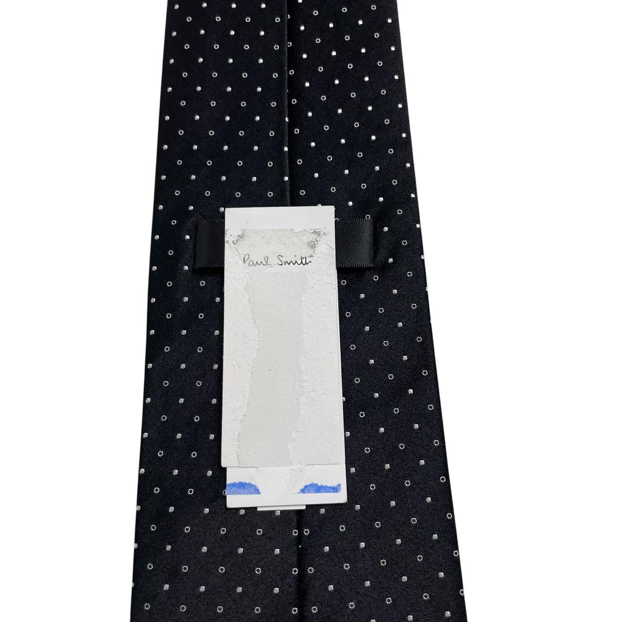 Paul Smith black and white polka dot silk tie with logo and tags attached.