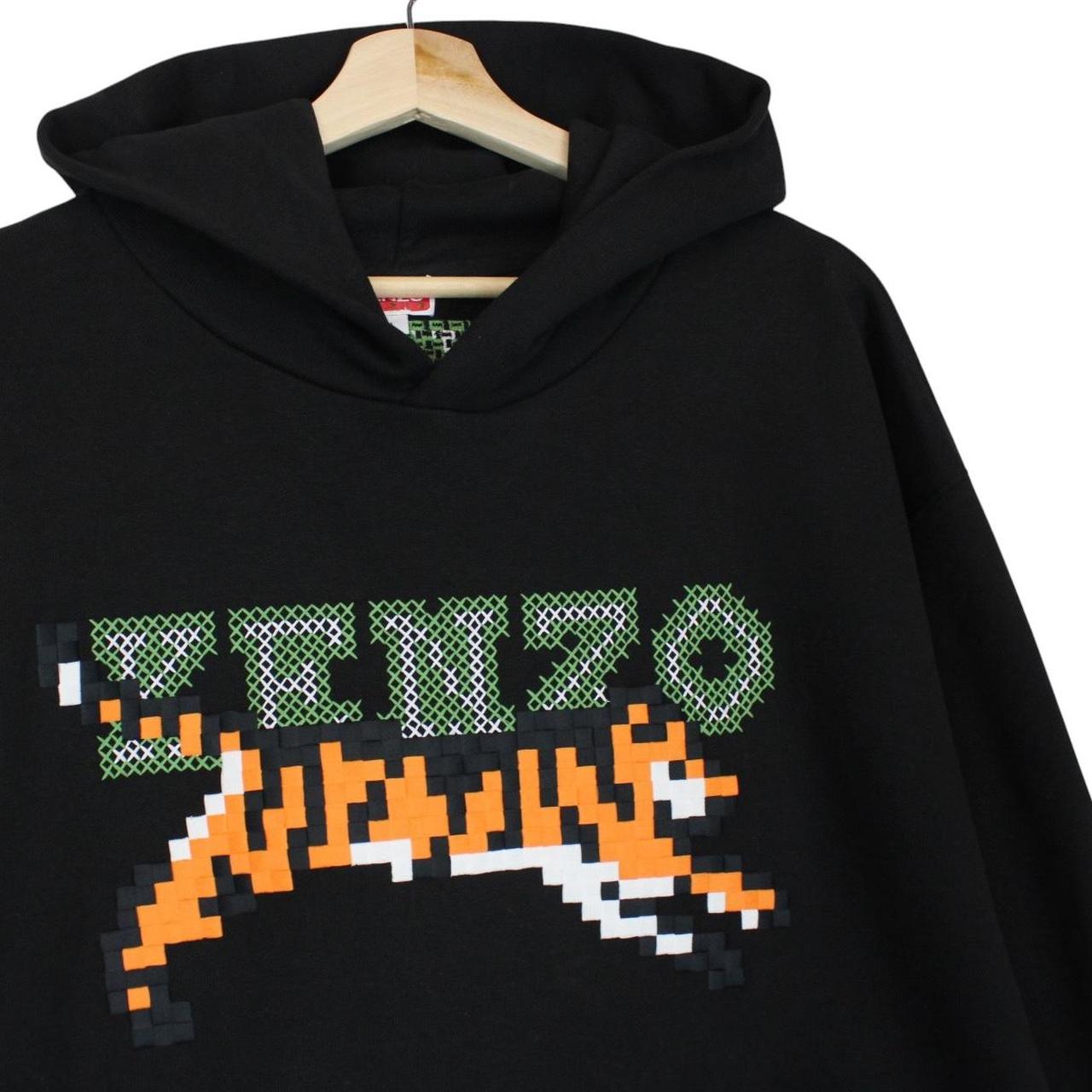 Kenzo black hoodie featuring digital tiger design and cotton material.
