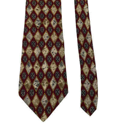 Christian Dior cream silk tie with multicoloured abstract print and logo detail.