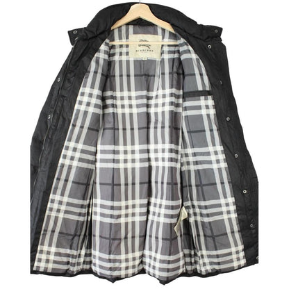 Burberry black puffer coat with Nova Check pattern and belted waist detail.