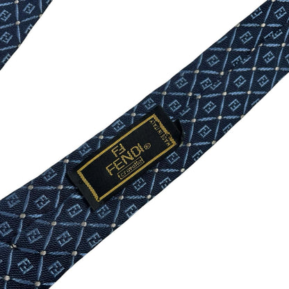 Fendi navy blue silk tie with Zucca monogram pattern and logo detail.
