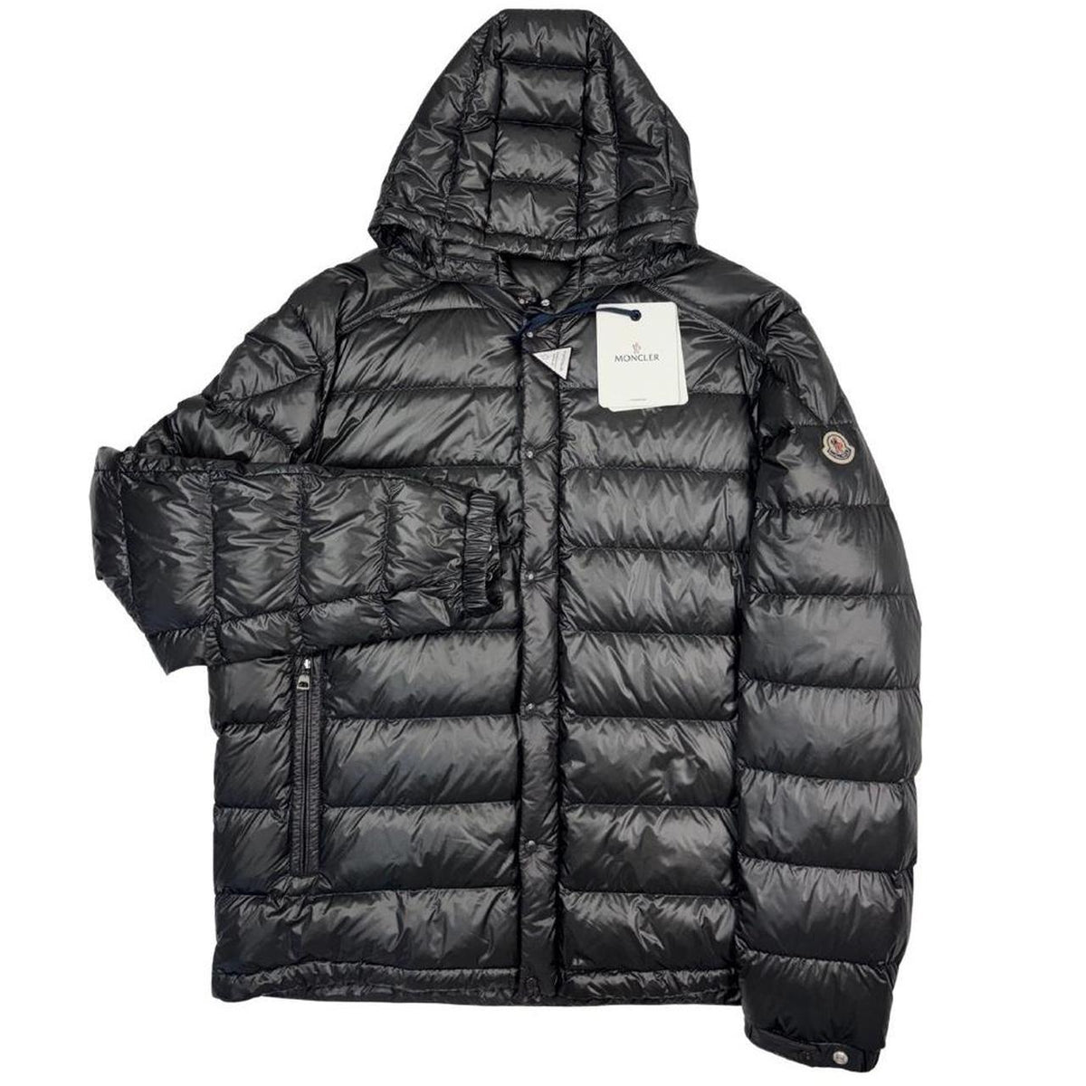 Moncler grey down nylon hooded puffer jacket with logo patch and quilted design.