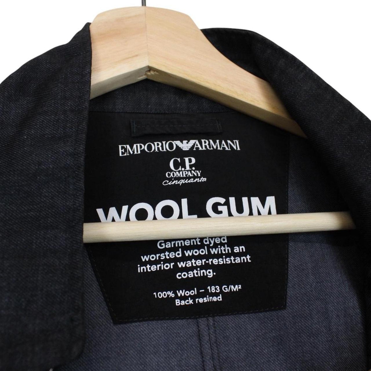 CP Company navy blue jacket garment dyed wool with logo details and gum finish.