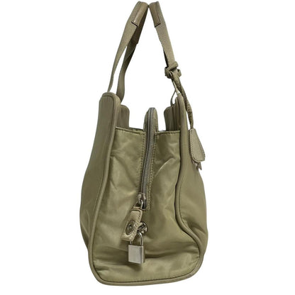 Prada green nylon duffel bag with logo detail and working lock and key.