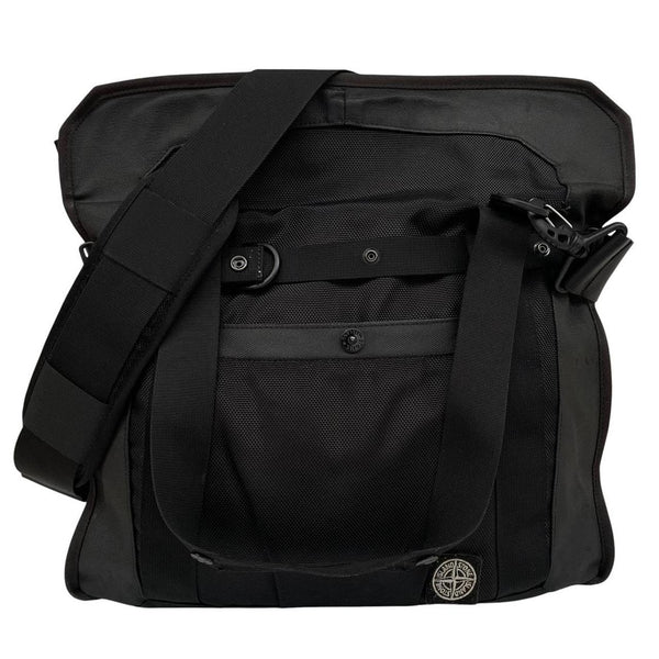 Stone Island black nylon tote bag with logo patch and crossbody strap.