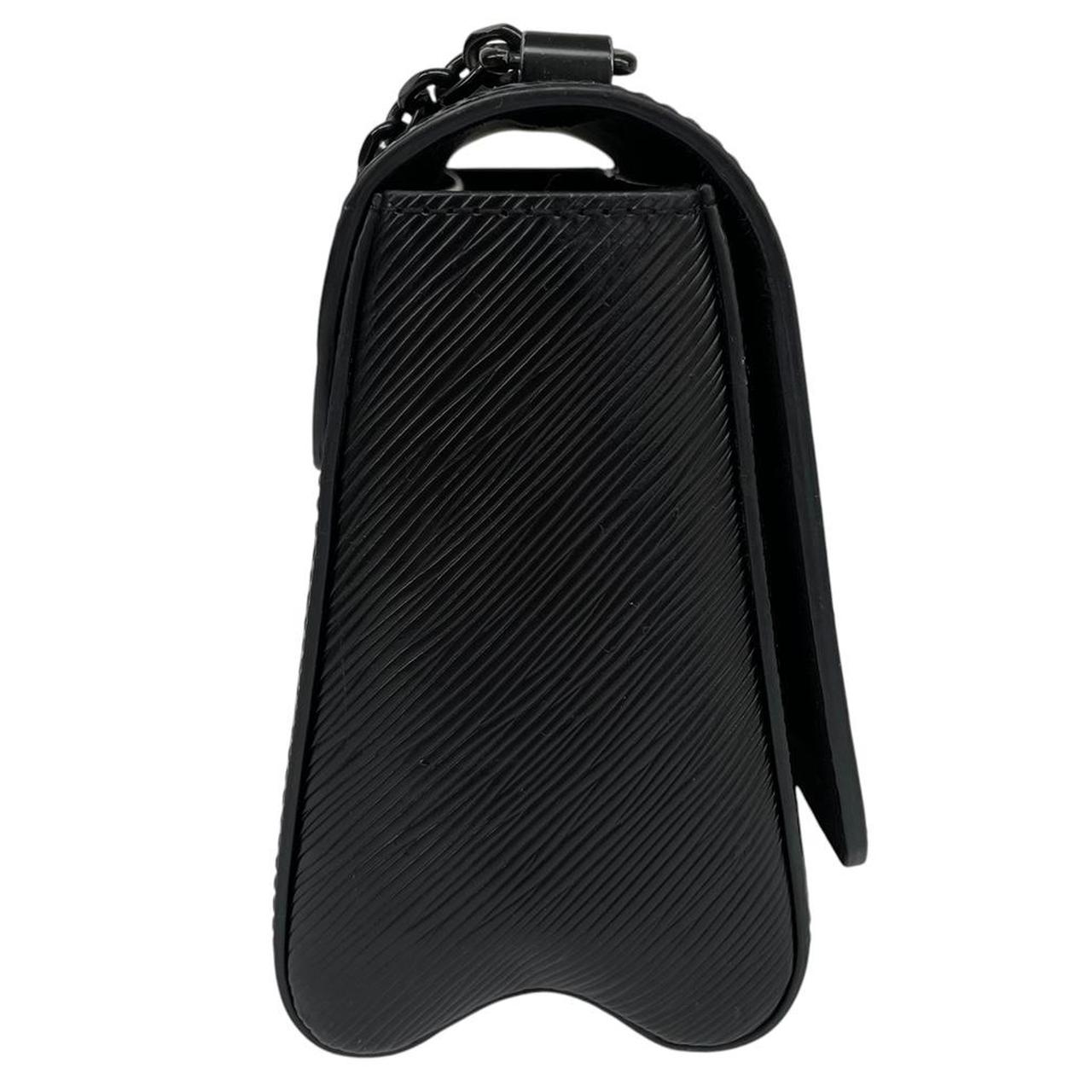 Louis Vuitton black Epi leather duffel bag with twist lock and visible wear.