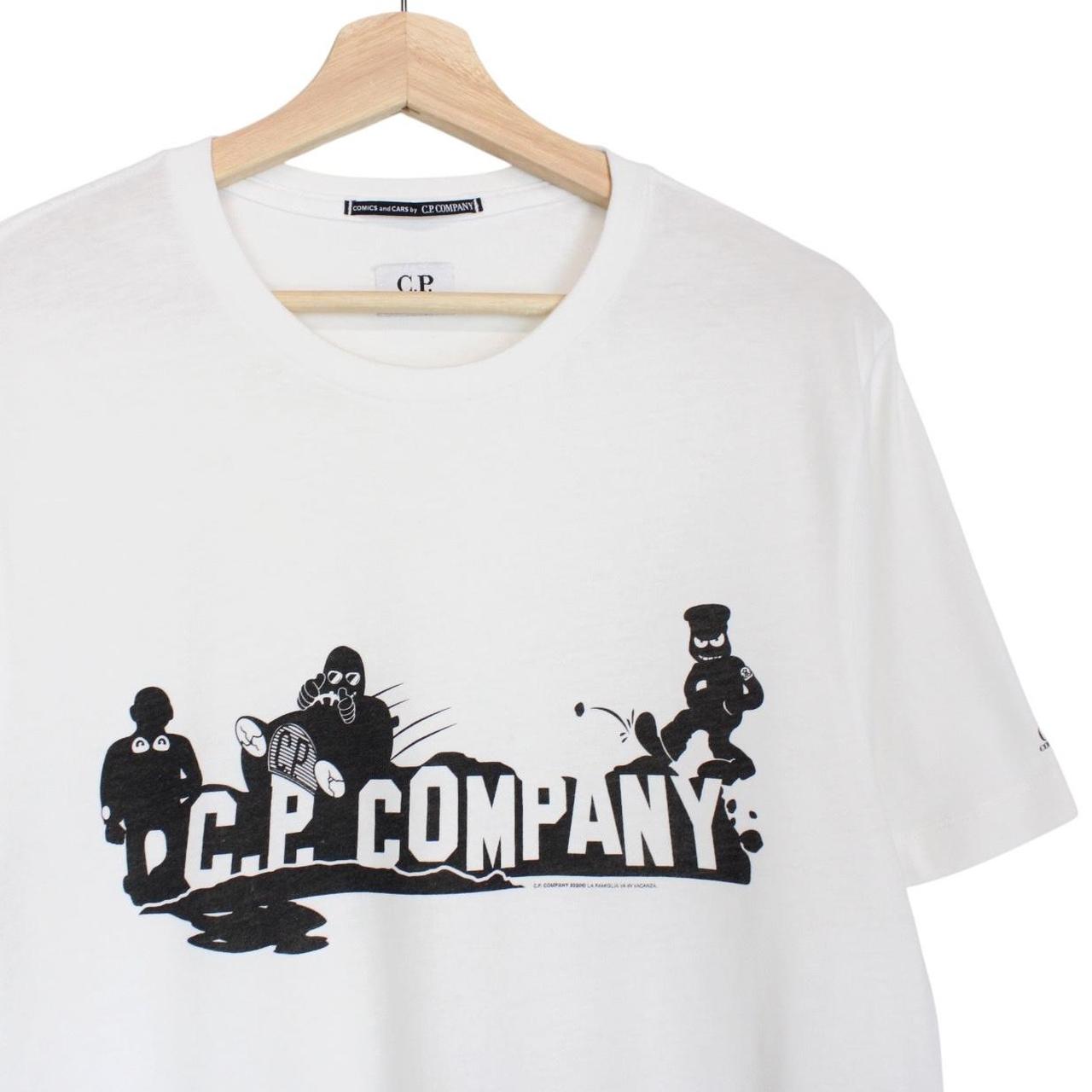 CP Company black and white comic print cotton t-shirt with pocket detail.