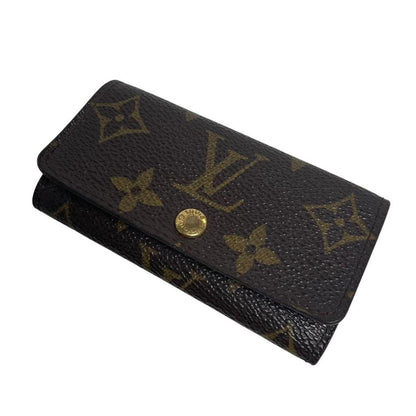 Louis Vuitton brown and tan monogram canvas key case with logo detail.