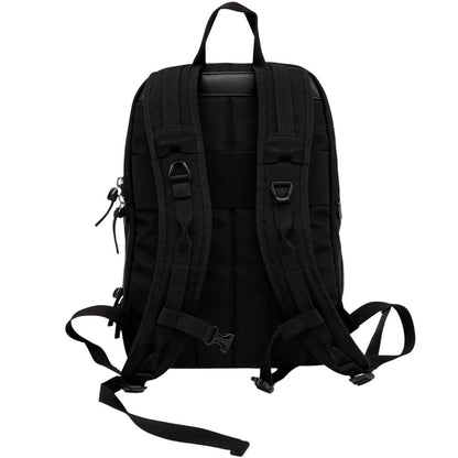 Moncler black duffel bag with logo patch and durable material, pre-loved condition.