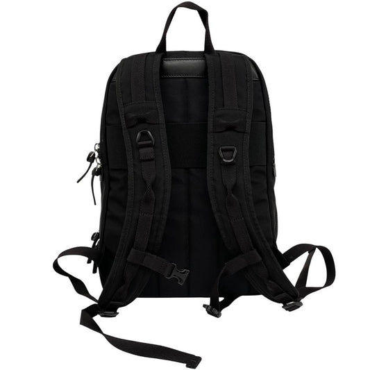 Moncler black duffel bag with logo patch and durable material, pre-loved condition.