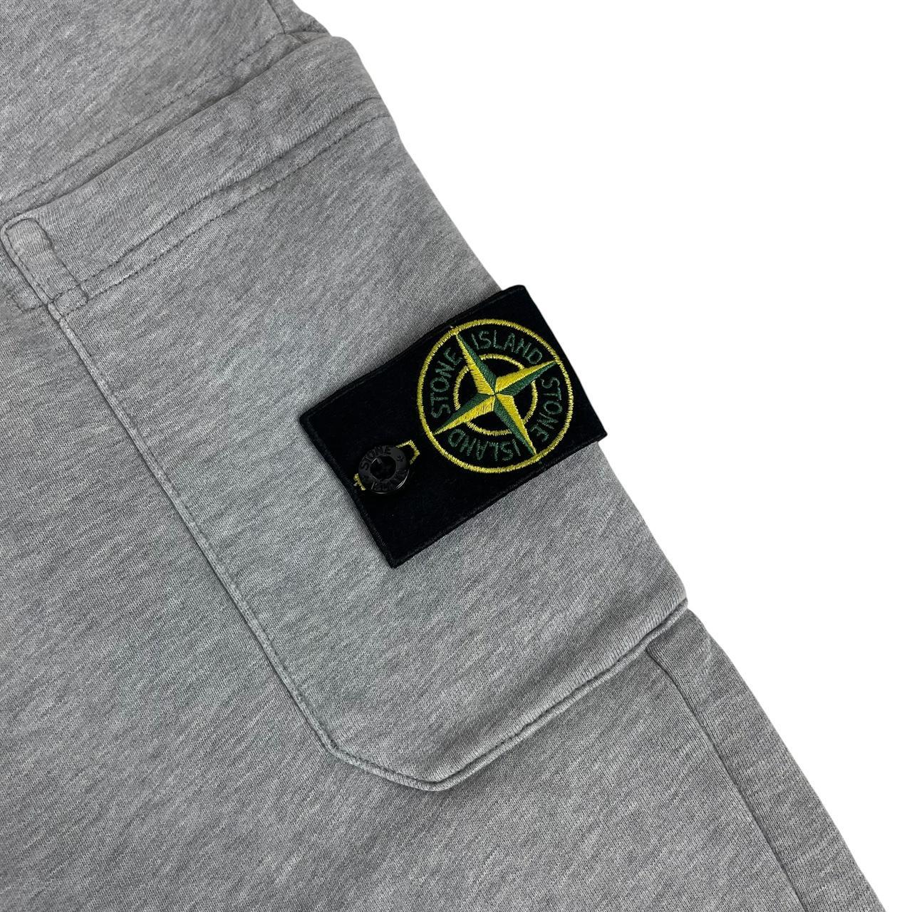 Stone Island grey joggers with logo patch and cotton material, size small.