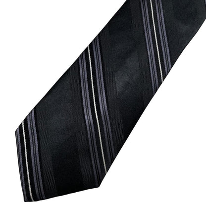 DKNY black silk tie with vintage striped pattern and logo detail.