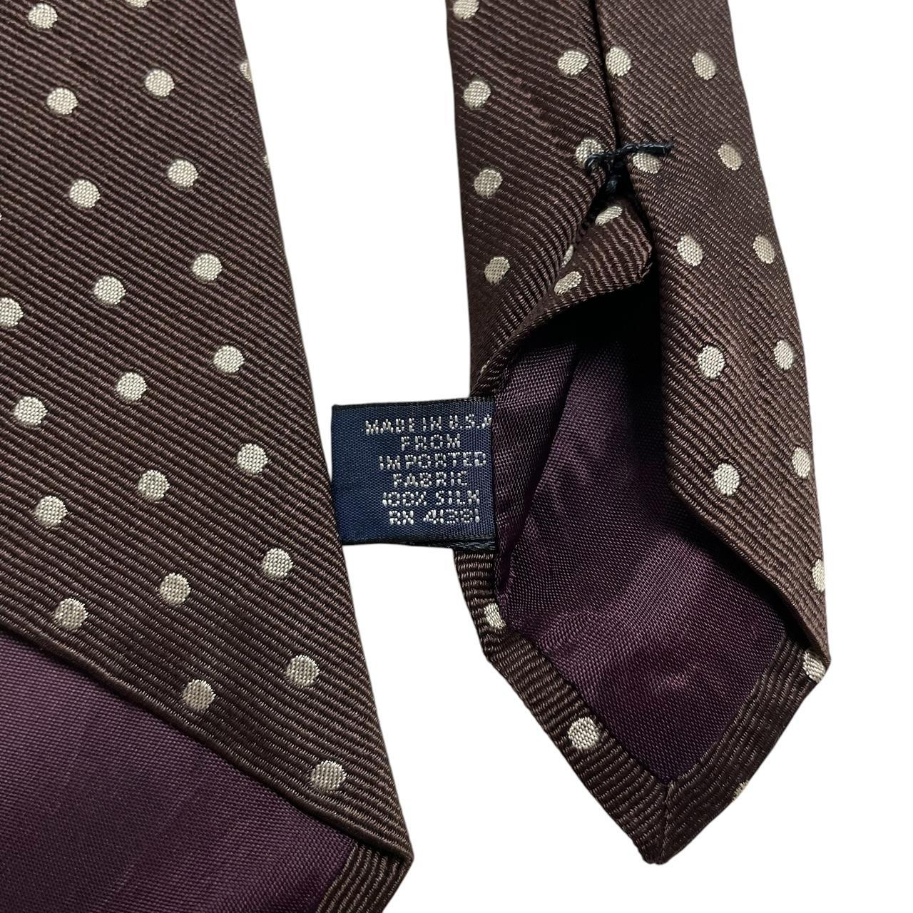 Polo Ralph Lauren beige and brown polka dot silk tie with classic logo detail.