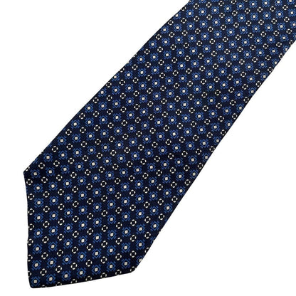 Christian Dior navy blue silk tie with subtle sheen and classic design.