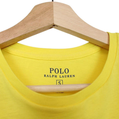 Polo Ralph Lauren yellow short sleeve cotton t-shirt with pocket and logo detail.