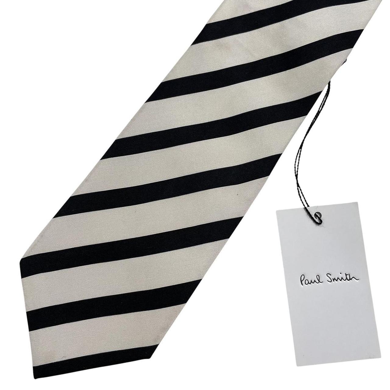 Paul Smith black and white striped silk tie with logo detail, brand new with tags.