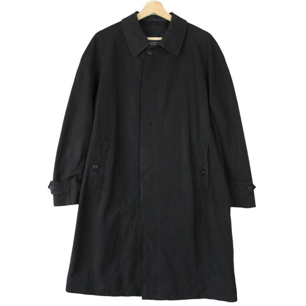 Burberry navy blue wool trench coat with single breasted design and classic logo.