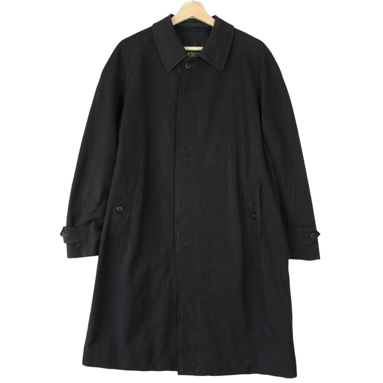 Burberry navy blue wool trench coat with single breasted design and classic logo.
