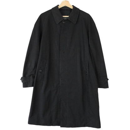 Burberry navy blue wool trench coat with single breasted design and classic logo.