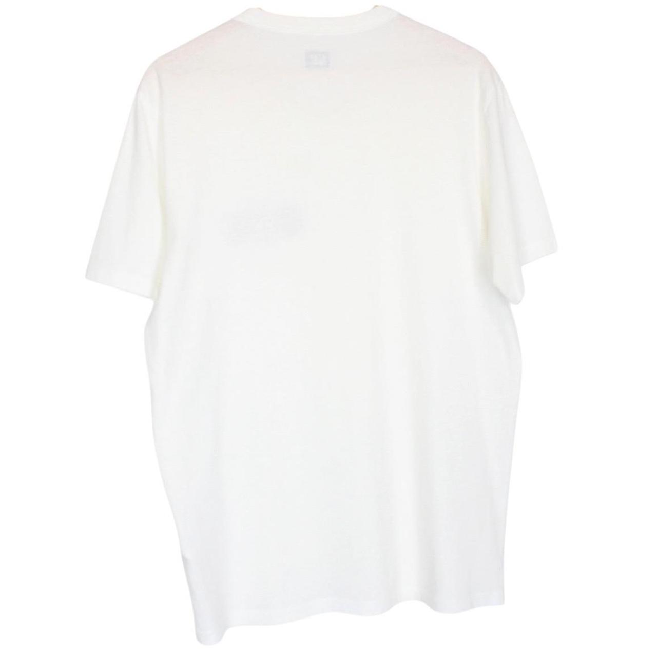 CP Company white short sleeve cotton t-shirt with chest logo print and pocket detail.