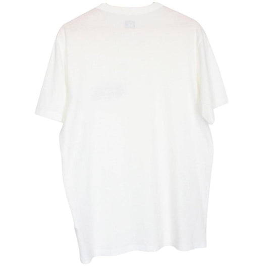 CP Company white short sleeve cotton t-shirt with chest logo print and pocket detail.