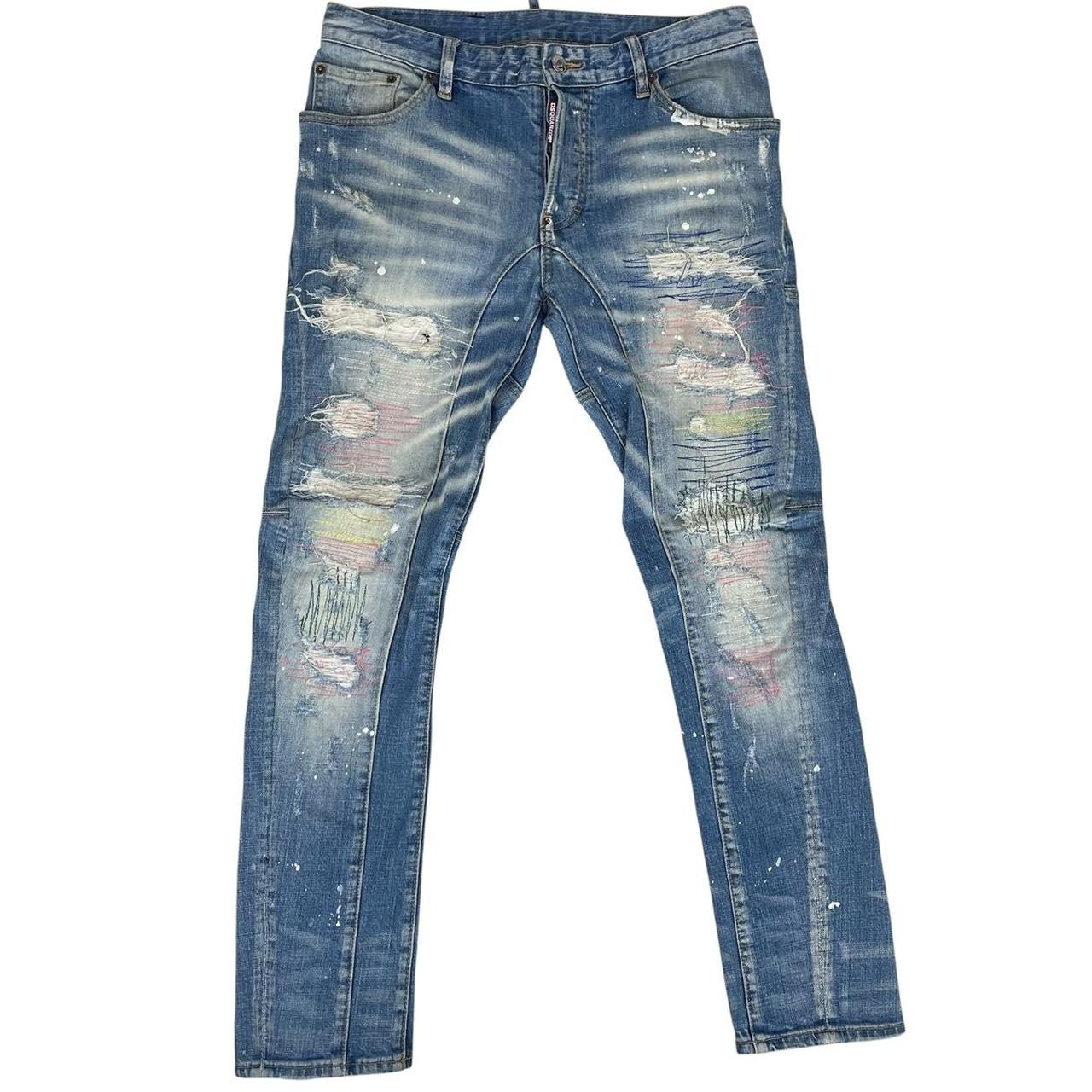 Dsquared2 blue straight jeans with distressed details and logo patch on back pocket.