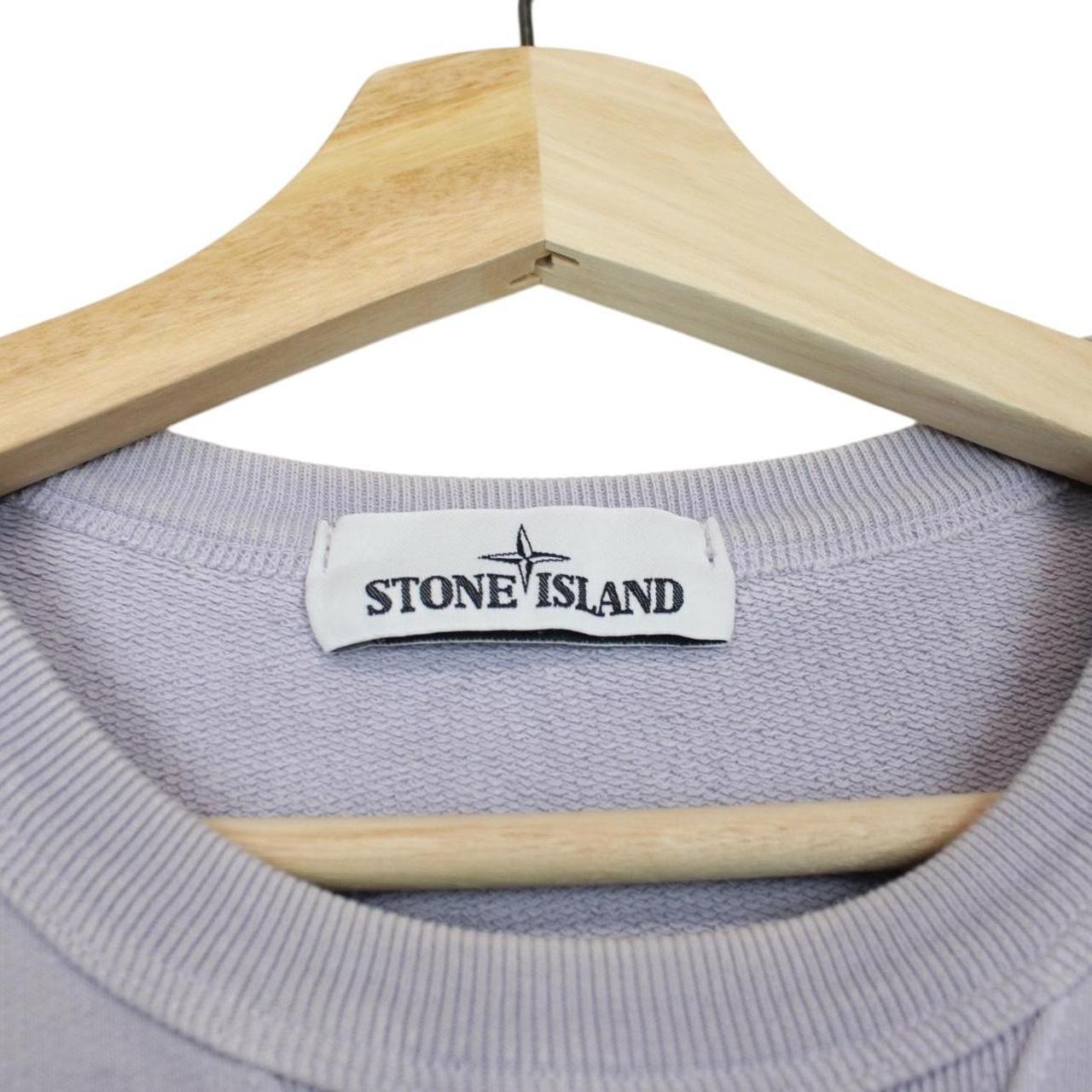 Stone Island lilac purple cotton sweatshirt with logo patch and ribbed cuffs.