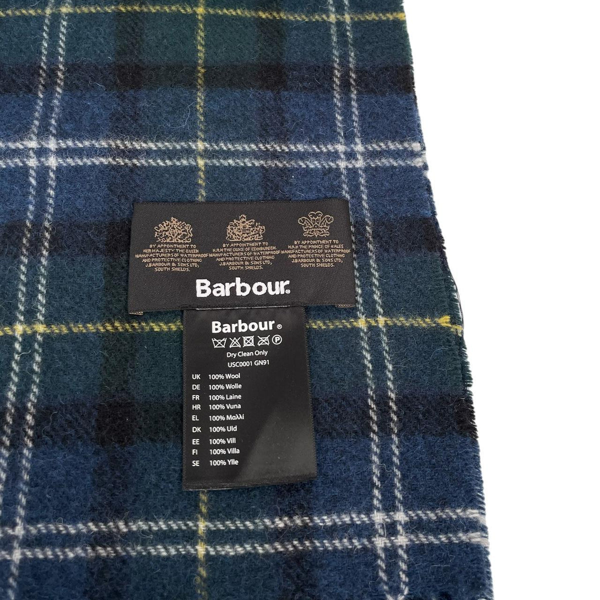 Barbour navy blue tartan check wool scarf with classic check pattern.