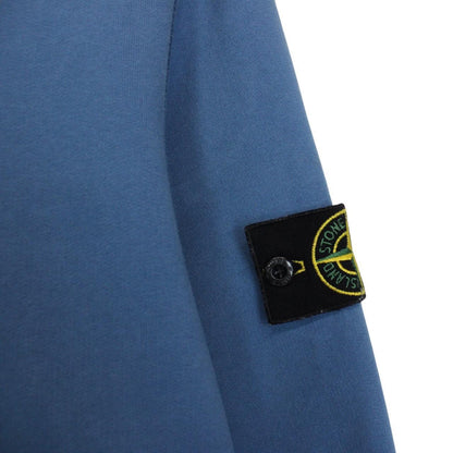 Stone Island blue cotton sweatshirt with iconic compass logo and ribbed cuffs.