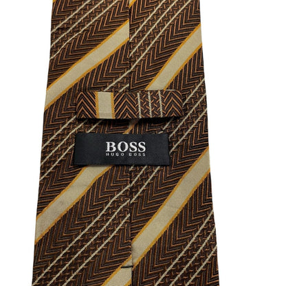 Hugo Boss striped silk tie in brown and beige with cream accents.