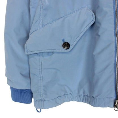 Stone Island blue jacket with logo patch and micropile texture, size small.