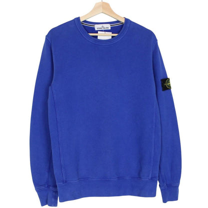 Stone Island blue cotton sweatshirt with logo patch and ribbed cuffs.