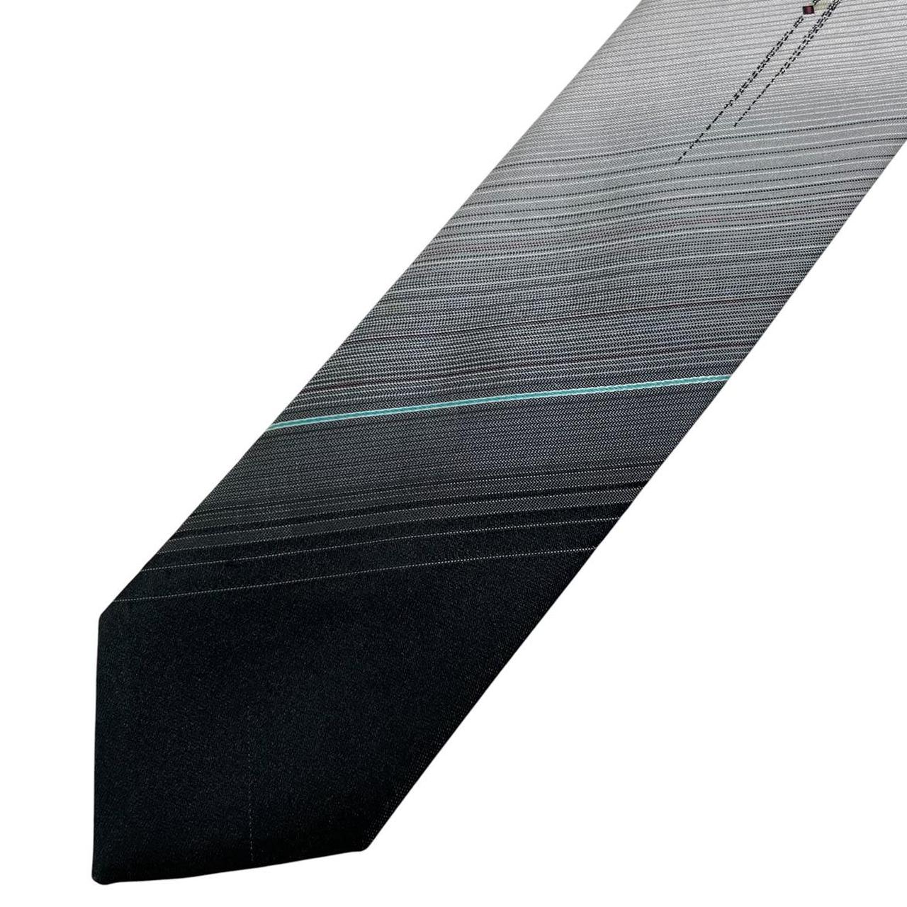 Christian Dior grey and black gradient tie, smooth polyester with subtle color transition.