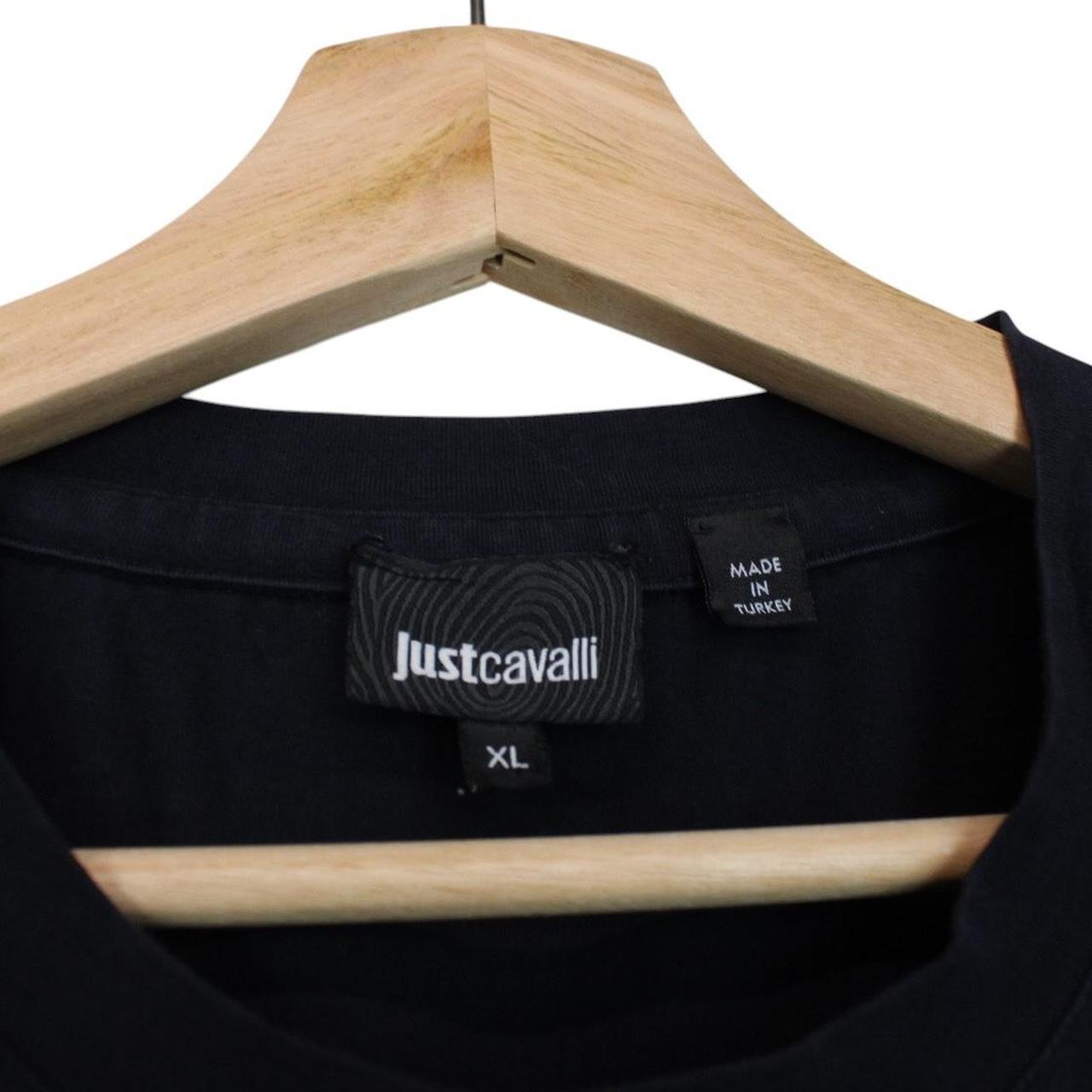 Just Cavalli navy blue cotton t-shirt with snake print and chest pocket detail.