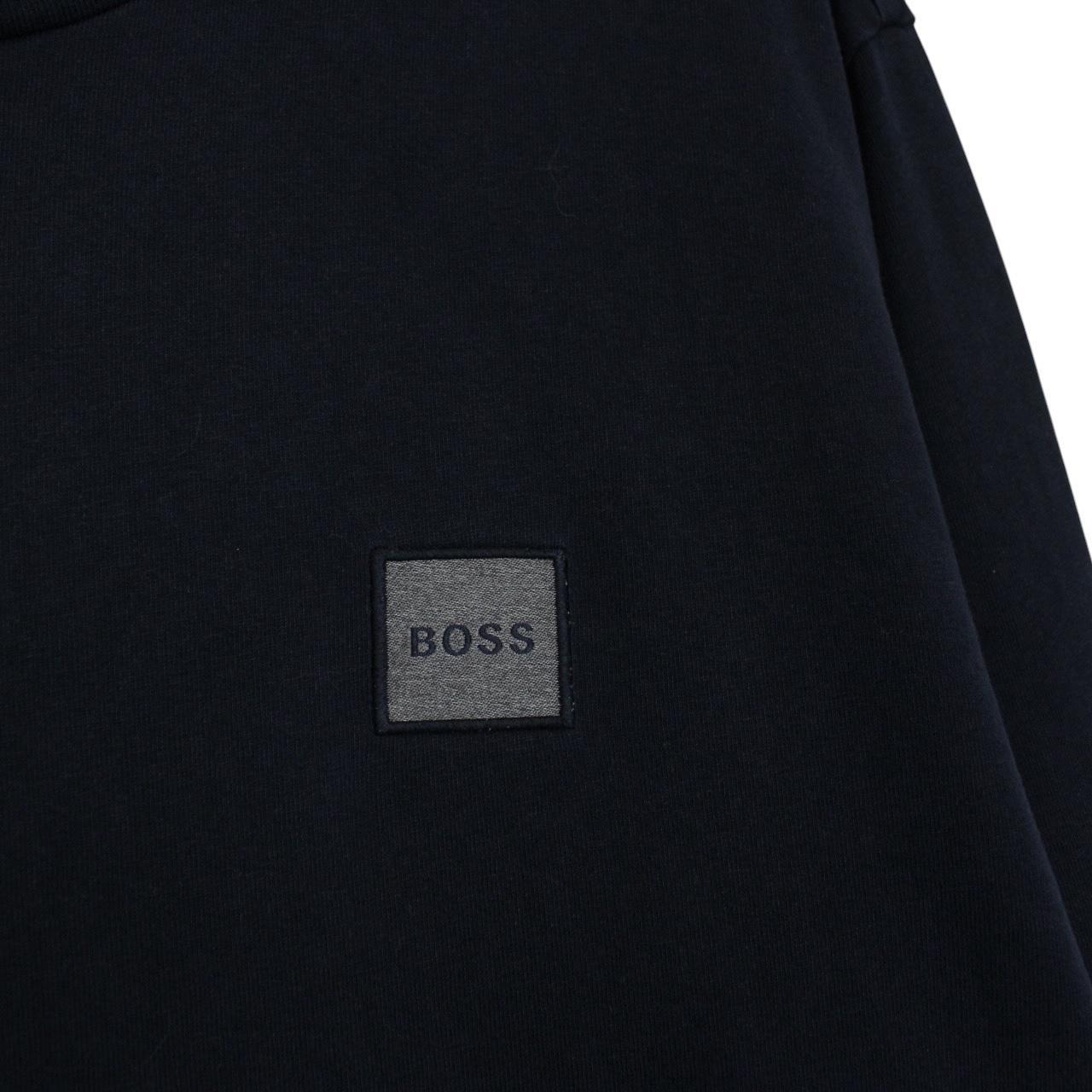 Hugo Boss navy blue long sleeve cotton t-shirt with logo patch on chest.