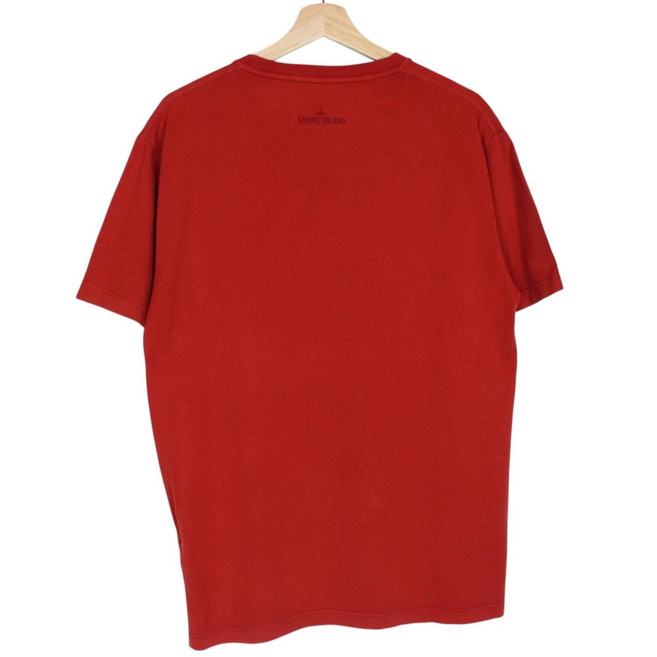 Stone Island red short sleeve t-shirt with reflective logo print and cotton material.