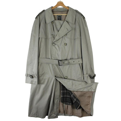 Christian Dior grey double-breasted trench coat with removable wool lining and belted waist.