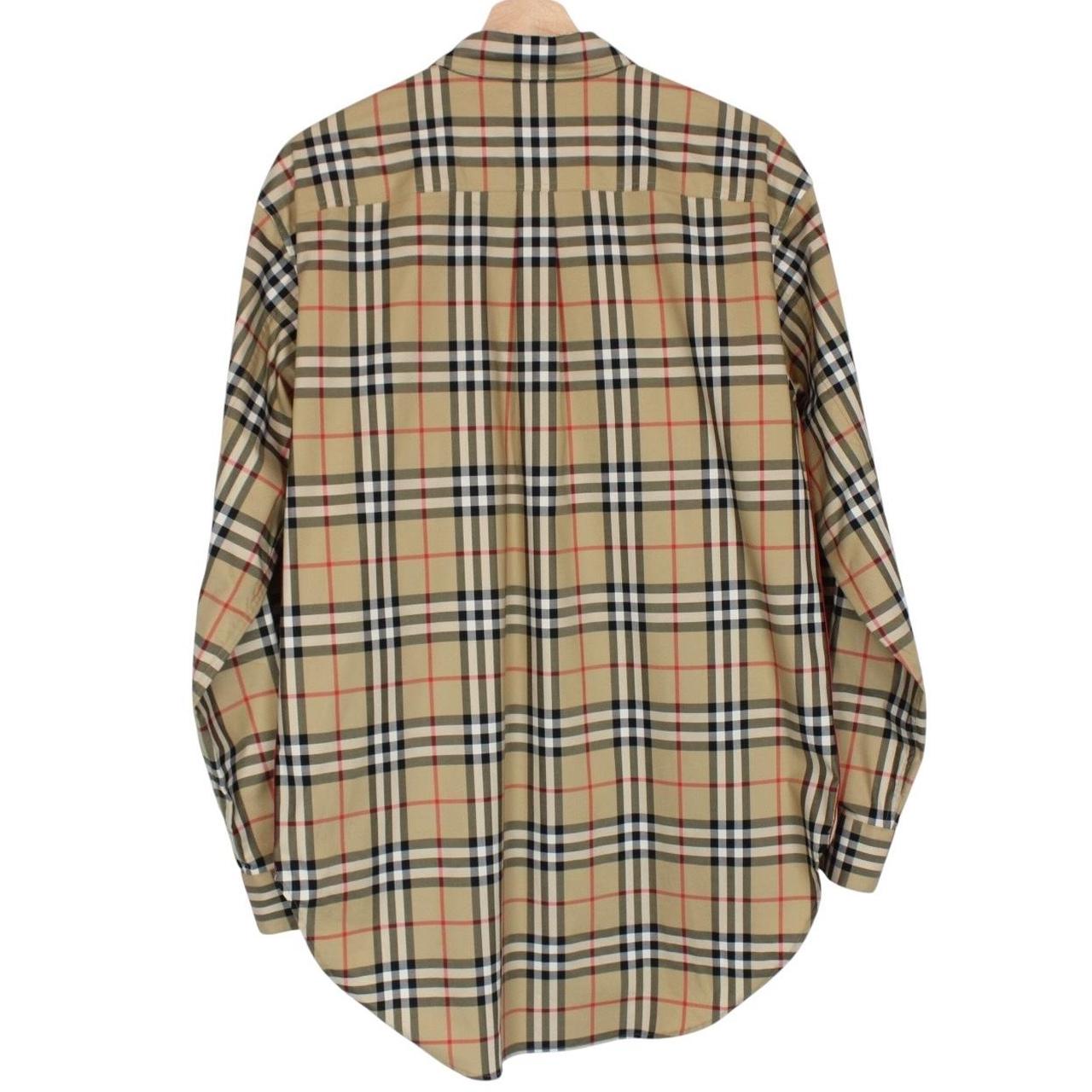Burberry tan brown long sleeve shirt with Nova Check pattern and logo detail.