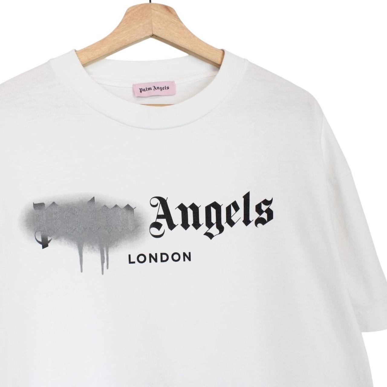Palm Angels white cotton t-shirt with sprayed print and chest pocket detail.