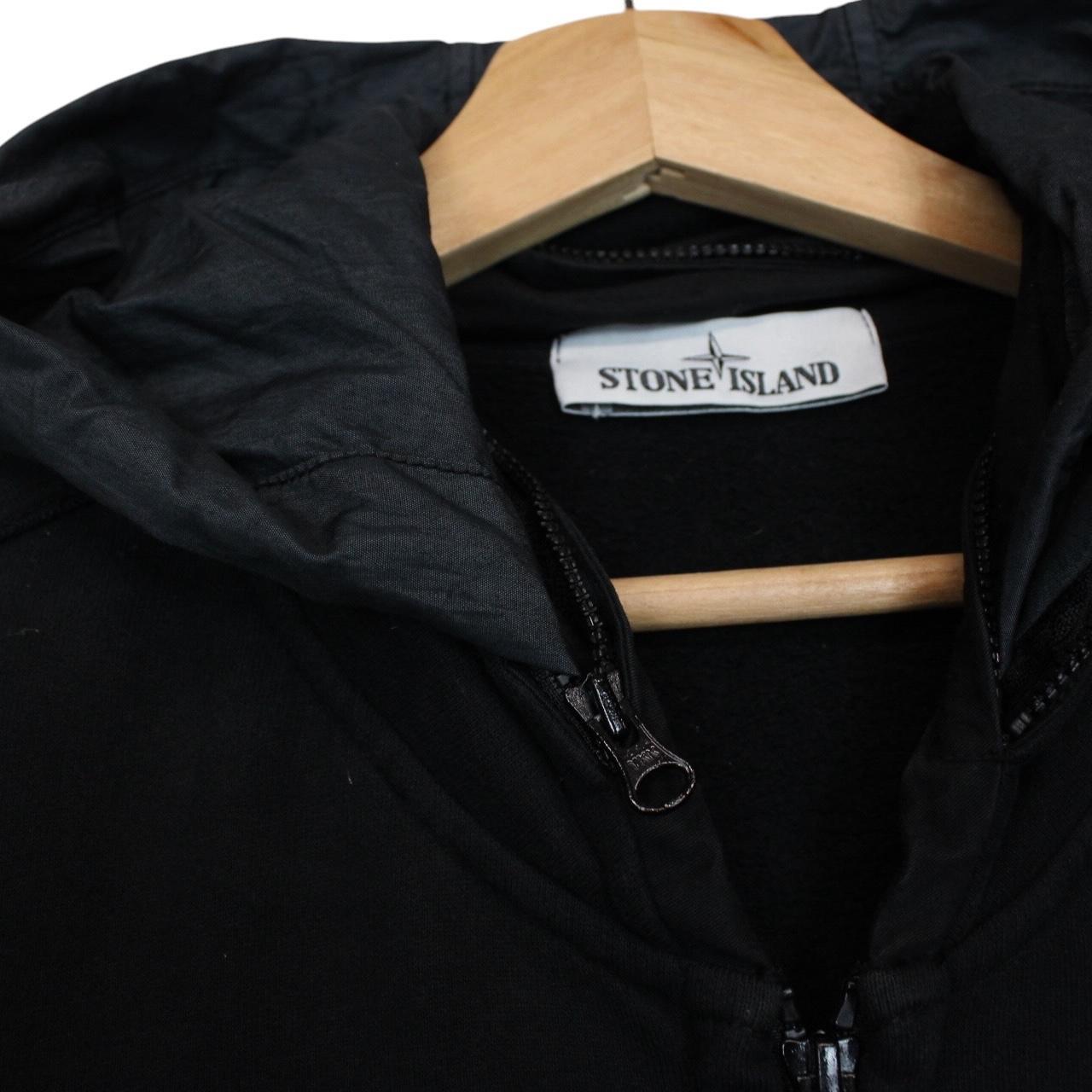 Stone Island black full zip hoodie with logo patch and cotton material.