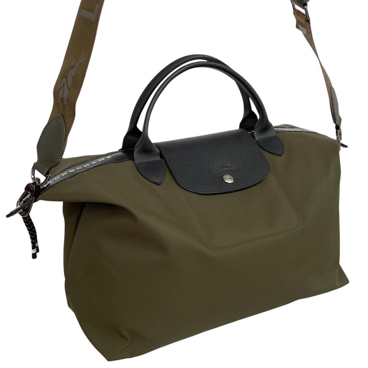 Longchamp green Le Pliage Enery tote bag with logo and durable nylon material.
