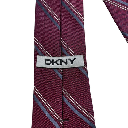 DKNY plum purple silk tie with a smooth finish and vintage design.