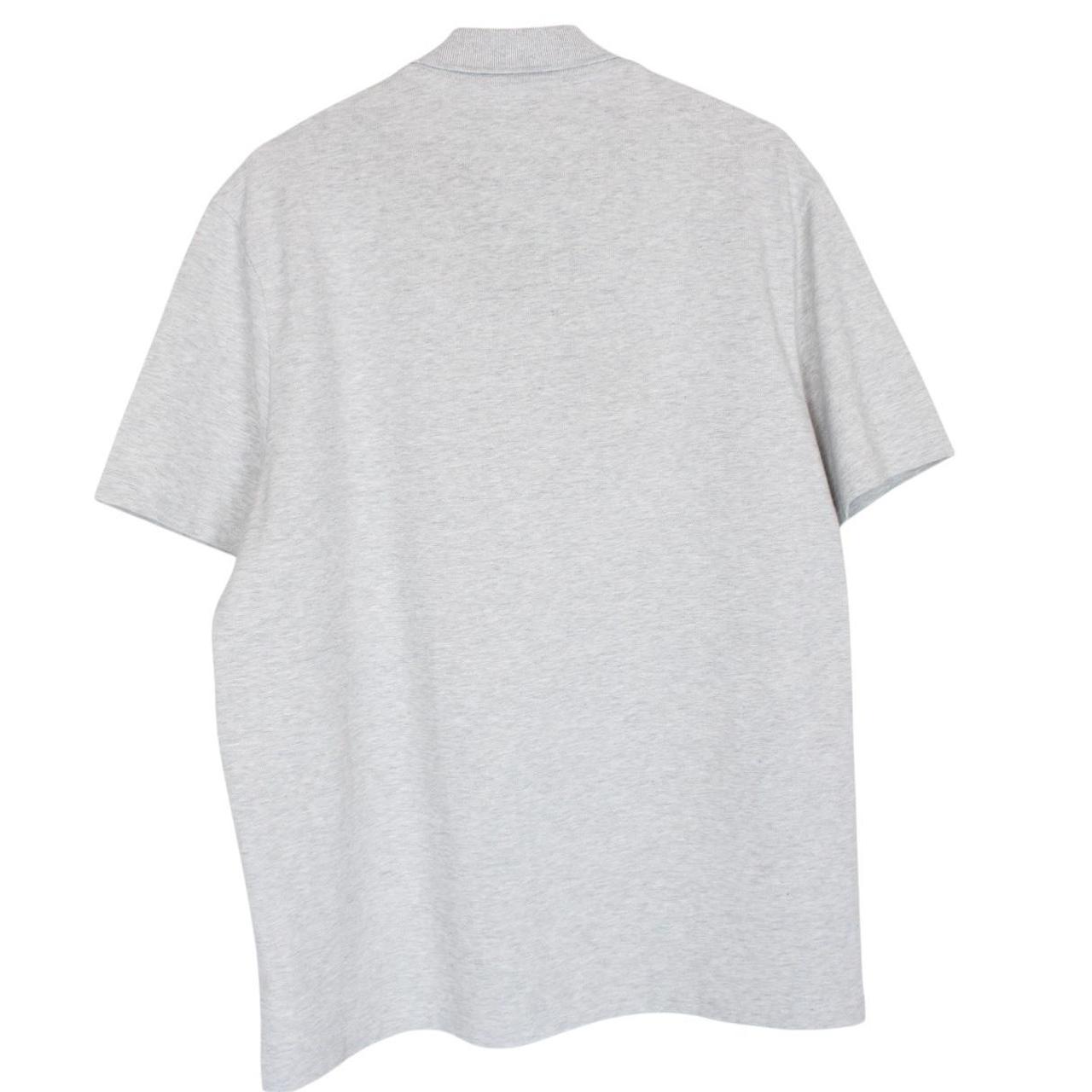 Lacoste grey short sleeve cotton polo shirt with embroidered crocodile logo.
