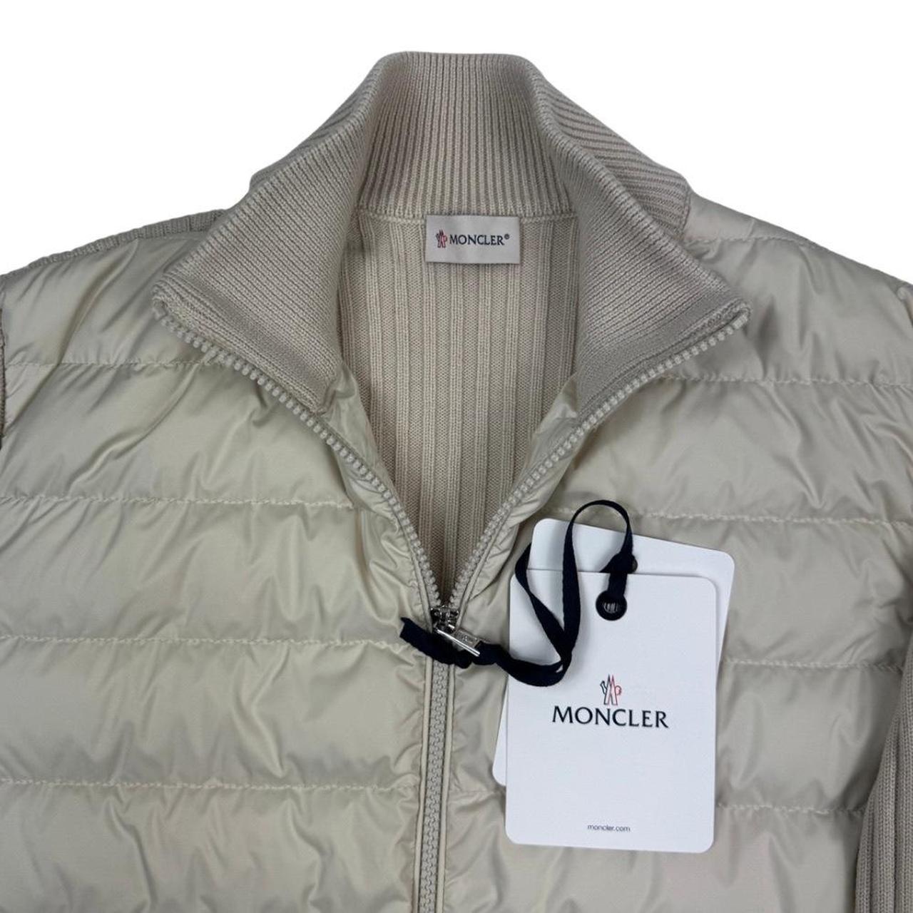 Moncler beige full zip jacket with logo detail and nylon/wool blend material.