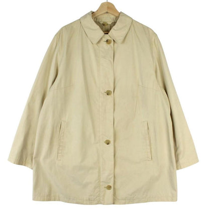 Burberry beige single breasted coat with logo detail and classic tailored design.